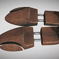 Two Wooden Shoe Stretchers With Natural Wood Construction And Top Knob Design