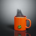 Orange Ceramic Mug With Camellia Tea Bag Steeping In Hot Water