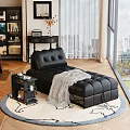 Black Leather Sofa Bed With Tufted Backrest Gray Blanket And Side Table