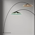 Modern Curved Floor Lamp With Green Shade And White Interior Glowing In Minimalist Room