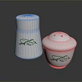White Ceramic Salt And Pepper Shakers With Green Decorative Patterns For Kitchen 3d model