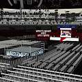 Sports Stadium Featuring White Folding Chairs Stage And Lighting Equipment For Fitness Events