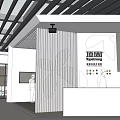 Modern Exhibition Hall Exterior With Streamlined Roof White Structure And Glass Entrance