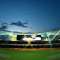Sports Fitness Live Broadcast On Giant Screen With Bright Lighting In Evening Stadium