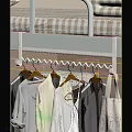 School Dormitory Organized Wardrobe Space With Wooden Hangers And Hanging Clothes