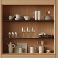 Elegant Tableware Set Arranged In Wooden Kitchen Cabinet With Bowls Plates Mugs And Glasses
