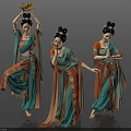 Three Women Dancing in Traditional Teal Orange Costumes With Intricate Patterns and Hairstyles