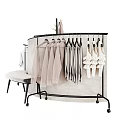 Stylish Clothing Display With Hanging Garments Wooden Stands And Accessories