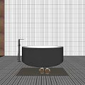 Modern Black Round Bathtub In Bathroom With White Vertical Striped Tile Wall And Metal Faucet