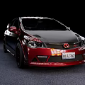 Modified Red Sedan With Black Rims And Racing Style Design
