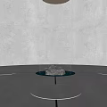 Concrete Circular Garden Ornament With Central Stone Water Flow And Overhead Lighting