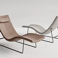 Upholstered Modern Lounge Chairs in Brown and Beige with Black Metal Frames and Curved Design