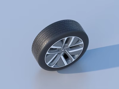 Car Tire With Silver Alloy Wheel Rim And Modern Tread Pattern Design 3d model