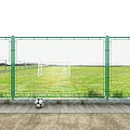 Football Field With Green Fence Grass Surface Goalposts And Soccer Ball