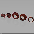 Red Circular Flanges Equipment With Various Sizes Arranged On Dark Background