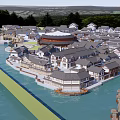 Waterfront Commercial Street With Central Circular Structure And Surrounding Buildings Layout
