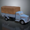 Vintage Light Blue Truck With Canvas Covered Cargo Bed And Classic Design