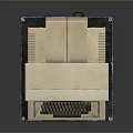 Vintage Portable Computer With Monitor Keyboard On Black Stand And Yellow Label