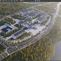 Modern School Buildings in Aerial View Surrounded by Trees Roads Parking Lots and Sports Courts