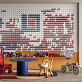 Colorful Building Blocks Wall in Children's Playroom with Chairs Table Toys and Rabbit Doll