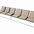 Row of Public Chairs With Metal Frame Light Brown Seats and Armrests