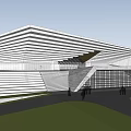 Modern Museum Building With Geometric Sloped Roof And Glass Facade In Grass Field