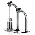 Modern Dual Stainless Steel Water Faucets With Flowing Water Into Glass Cup