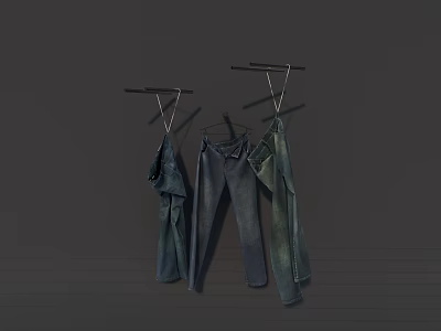 Hanging Clothes On Metal Racks With Denim Pants And Green Jackets 3d model