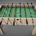Wooden Foosball Table With Green Playing Surface Red Blue Player Figures And Black Handles