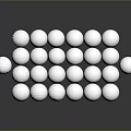 Silver Decorative Spheres Arranged in Matrix with Various Sizes and Textured Surfaces