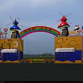 Colorful Amusement Park Entrance Gate with Rainbow Arch Mushroom Towers and Cartoon Decorations