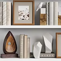 Elegant Decorative Ornament Combination With Photo Frames Sculptures Books Potted Plant And Clock On Shelves