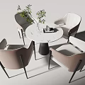 Modern Round Marble Table with Four Upholstered Chairs Metal Legs and Decorative Plant