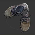 Worn Casual Lace Up Shoes With Scuffed Gray Brown Upper And White Soles