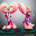 Anime Character Statues With Long Pink Yellow Hair And Fox Tails On Green Base Stands