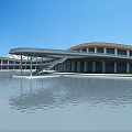 Modern Museum Building with Curved Roof Connecting Skybridge and Water Reflection Against Blue Sky Background