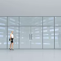 Modern Glass Door Entrance With Two Business People And Interior Plants