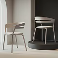 Modern Leisure Chairs With Metal Frame And Upholstered Seat In Minimalist Interior On Display Stand