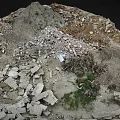 Rocky Mountainous Terrain With Debris Soil And Small Vegetation