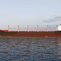 Large Cargo Ship With Red Black Hull On Sea 3d model