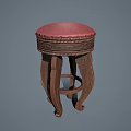 Elegant Wooden Stool with Red Cushion and Intricate Carved Legs