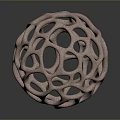 Artistic Pink Hollow Sphere With Intricate Geometric Design And Textured Surface