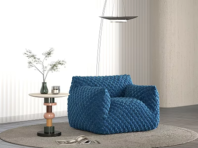 Cozy Blue Knitted Bean Bag Chair On Gray Rug With Side Table And Green Plant 3d model