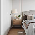 Cozy Bedroom Interior With Wooden Nightstand Table Lamp Floral Vase And Soft Bedding