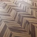Herringbone Wooden Flooring With Natural Brown Wood Tones And Classic Geometric Pattern