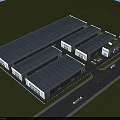 Industrial Plant With Multiple Connected Buildings Flat Metal Roofs Greenery And Access Road