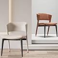 Modern Dining Chairs Featuring Light Beige Brown Leather Seats Curved Backrests And Black Metal Legs