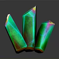 Polished Black Stone Surface Displaying Green Crystals With Colorful Tips