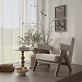 Beige Accent Chair With Wooden Legs Side Table Curtains And Decorative Wall Art
