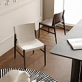 Modern Minimalist White And Brown Dining Chairs With Metal Legs On Wooden Floor